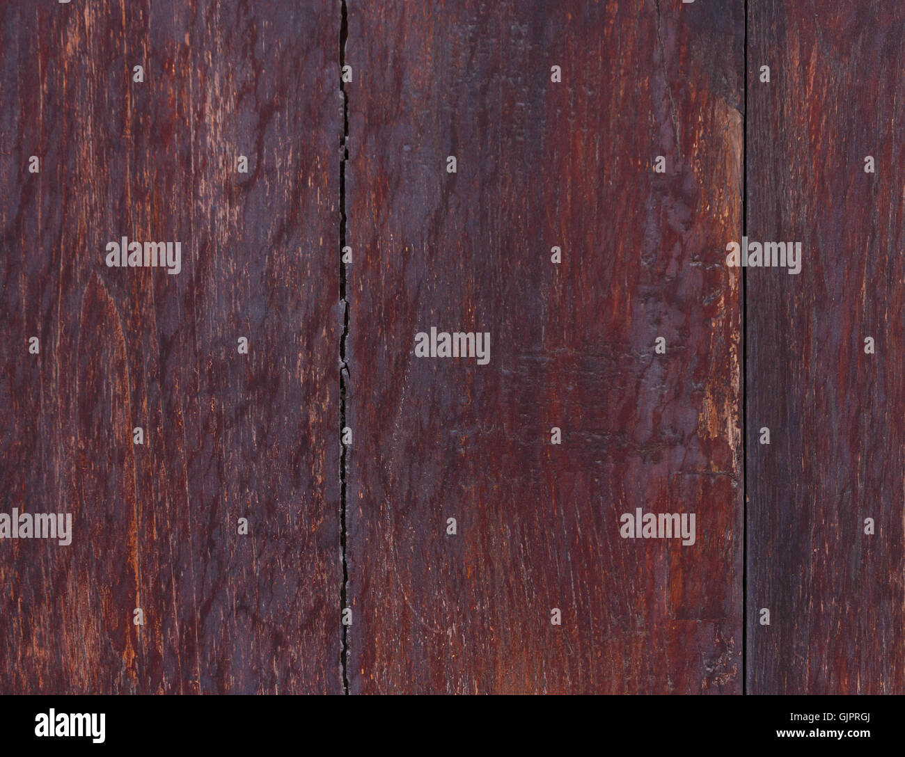 dunkle rote Holzwand Hintergrund Stockfoto