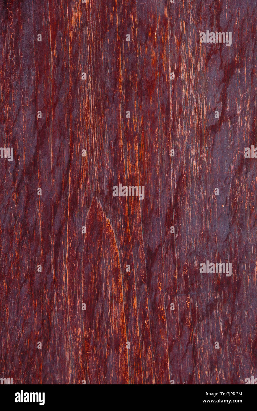 dunkle rote Holzbrett Hintergrund Stockfoto