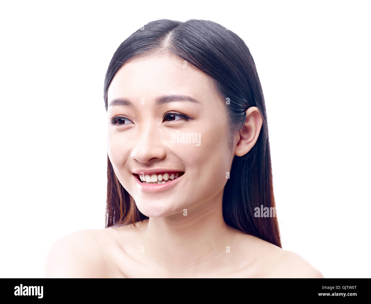 Studio-Porträt einer glücklichen jungen asiatischen Frau, isoliert auf weißem Hintergrund. Stockfoto