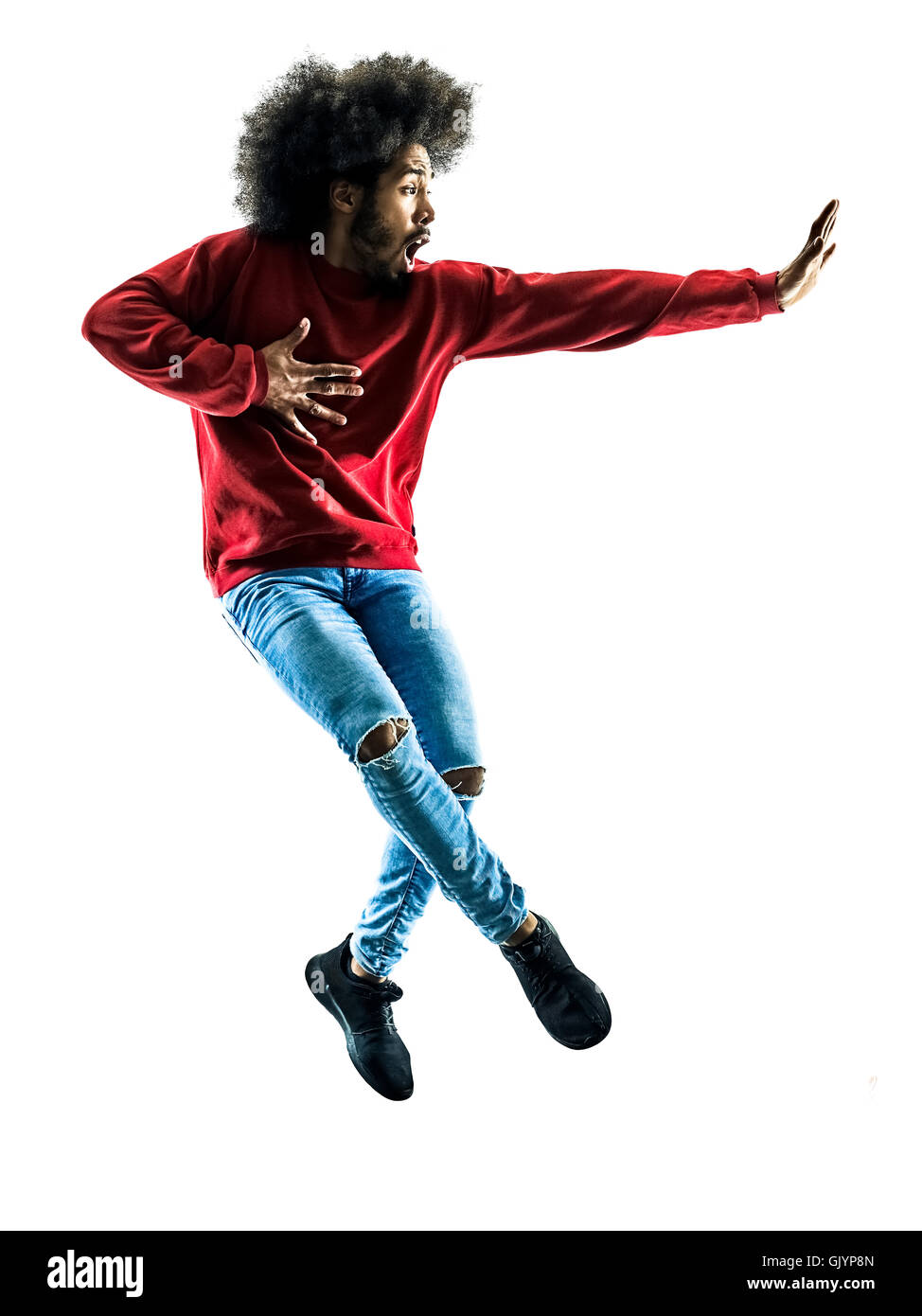 ein afrikanischer Mann Tänzer tanzen in der Silhouette isoliert auf weißem Hintergrund Stockfoto