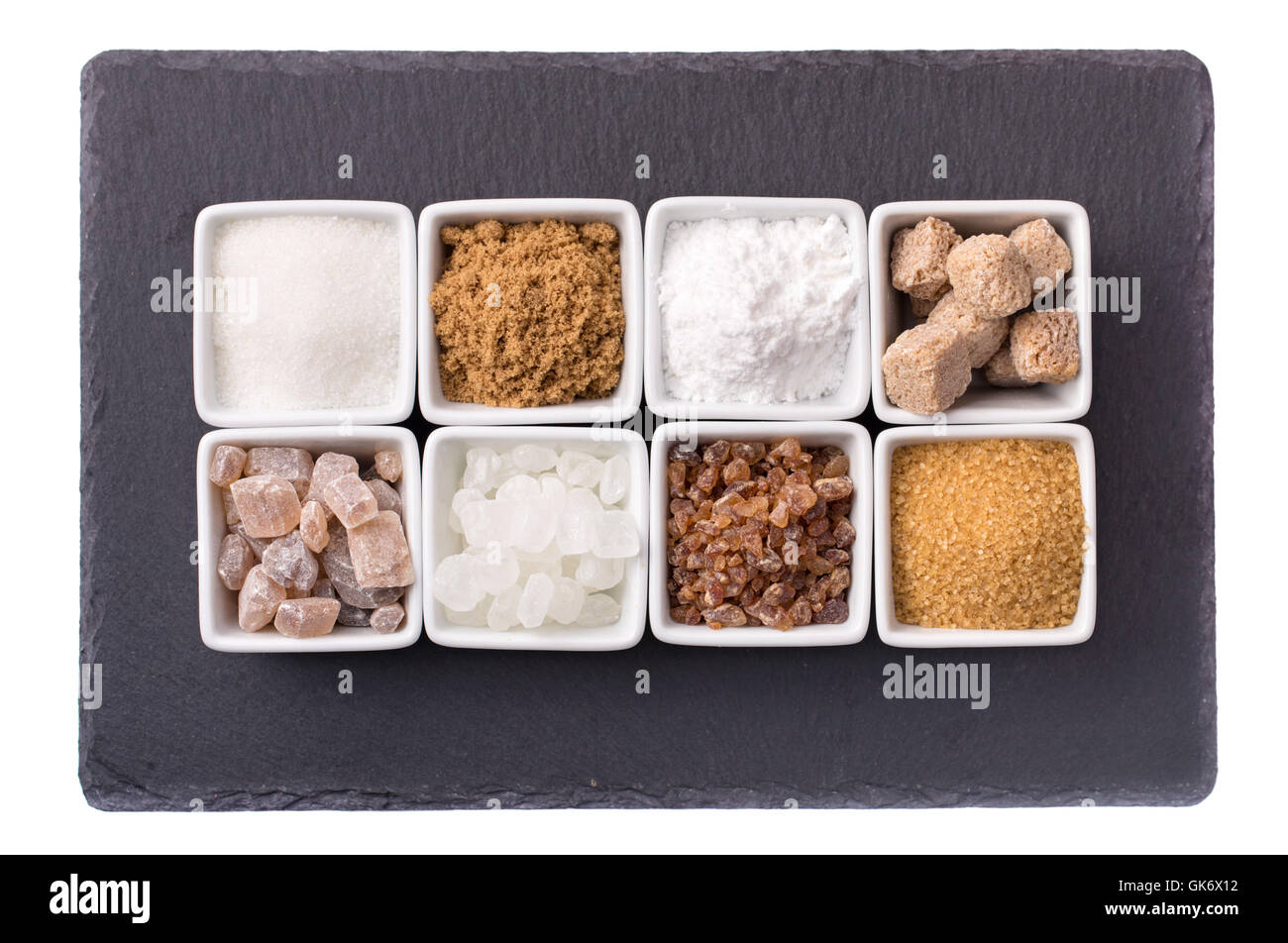 Acht Schalen von verschiedenen Arten von Zucker Stockfoto