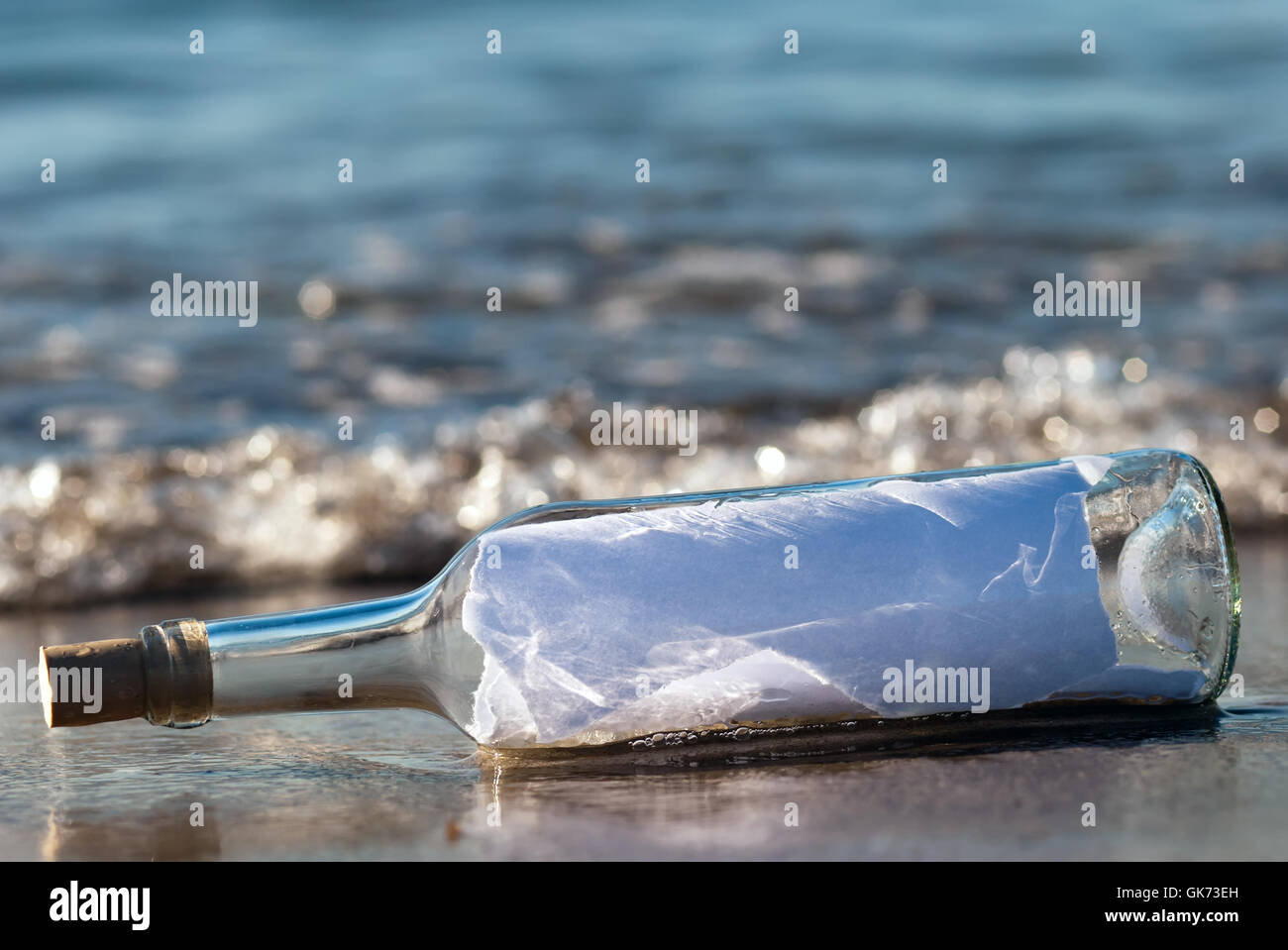 Flasche in surf Stockfoto