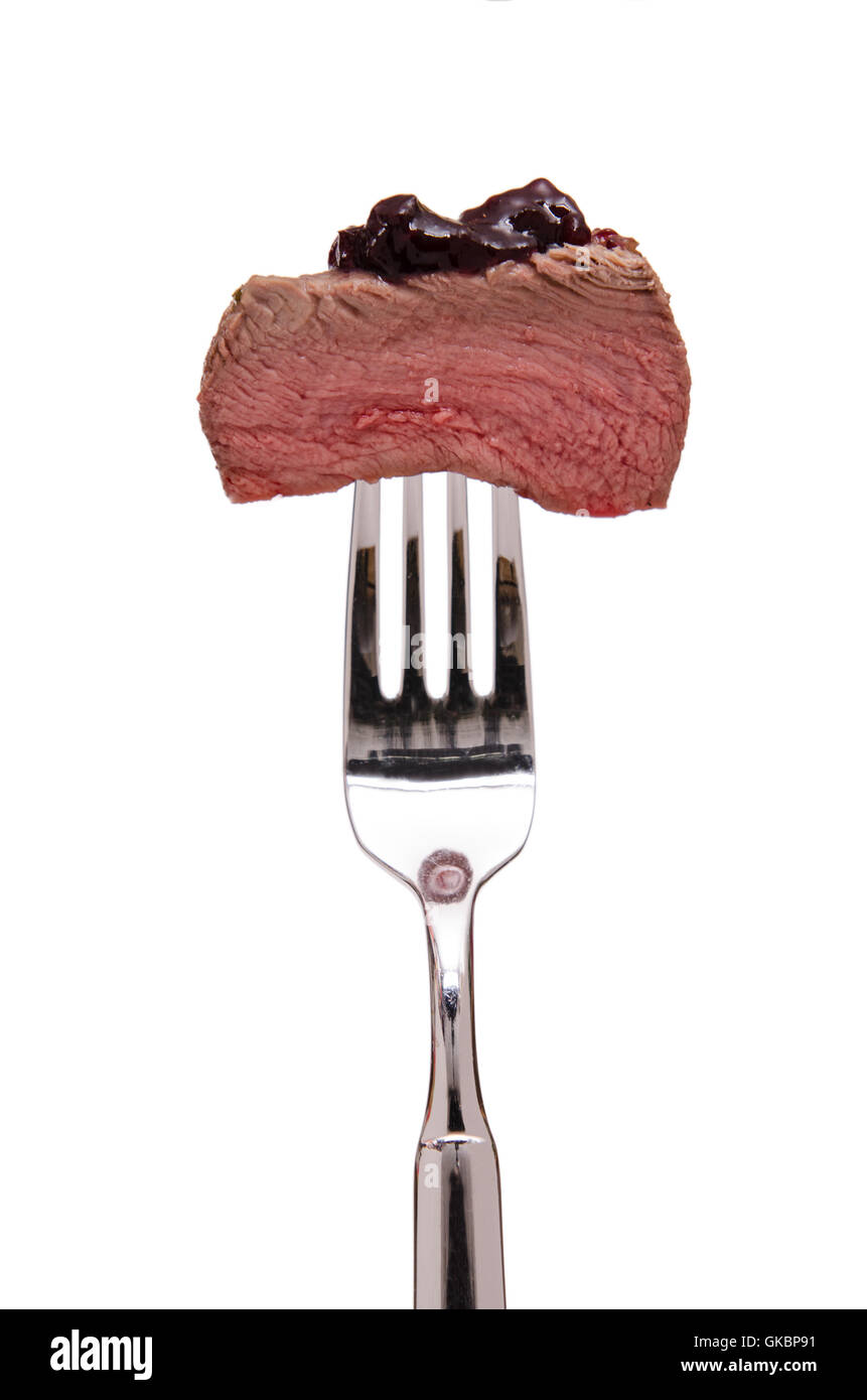 Filet vom Hirsch auf einer Gabel Stockfoto