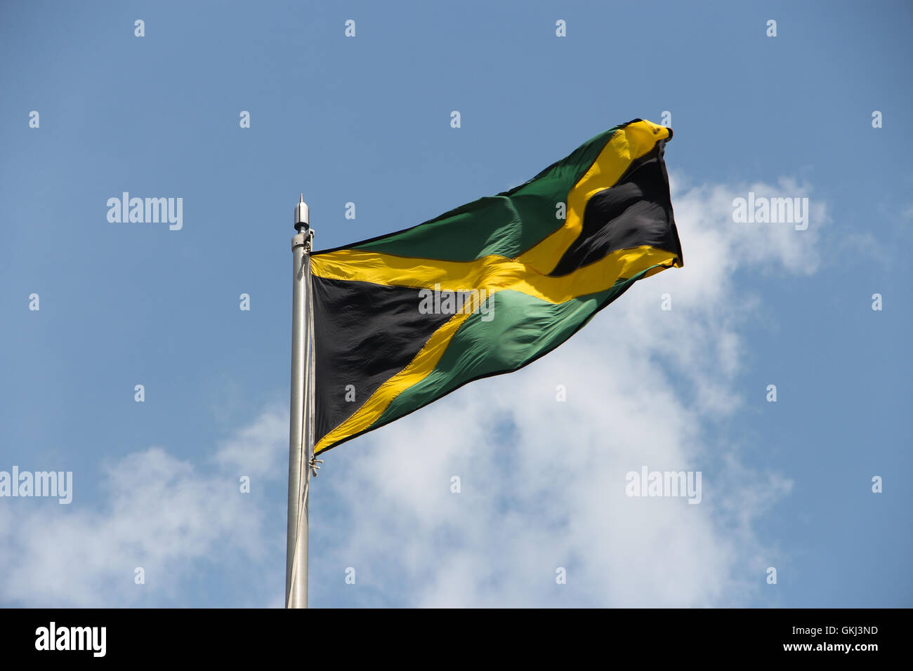 Die Flagge von Jamaika, The Cross schwarz, grün und gold angenommen: 6. August 1962 Olympiade Stockfoto