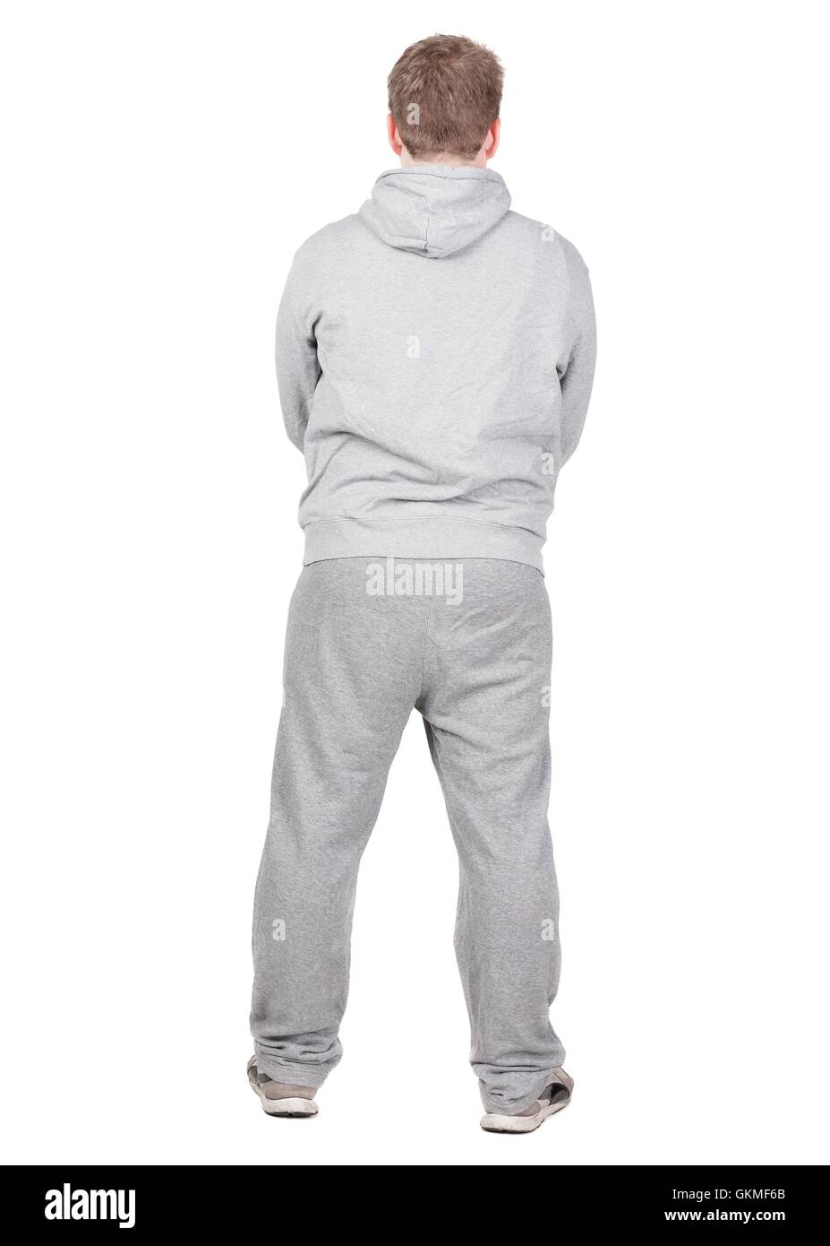 Rückansicht des jungen Athleten Kerl schaut Weg. Stockfoto