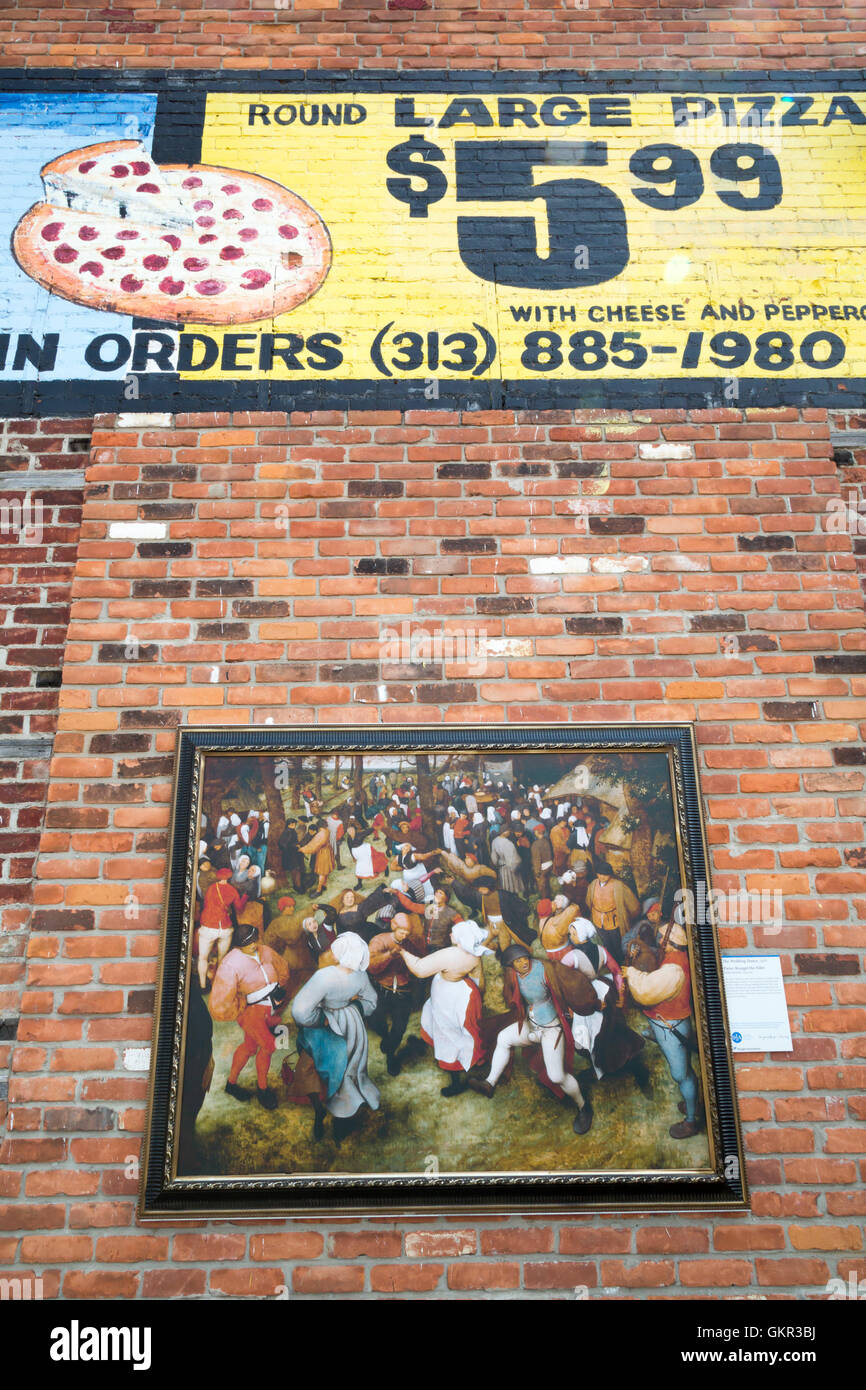 Detroit, Michigan - Reproduktion der Hochzeitstanz, ein 1566 Gemälde von Pieter Bruegel d. ä. an der Wand eines Pizza-Geschäft. Stockfoto