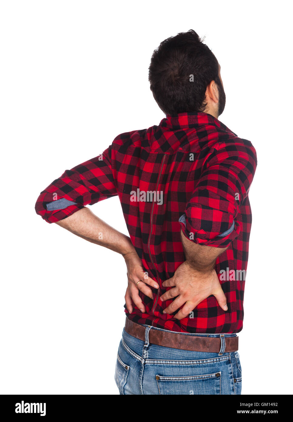 Holzfäller im karierten Hemd mit Rückenschmerzen isoliert auf weißem Hintergrund. Stockfoto