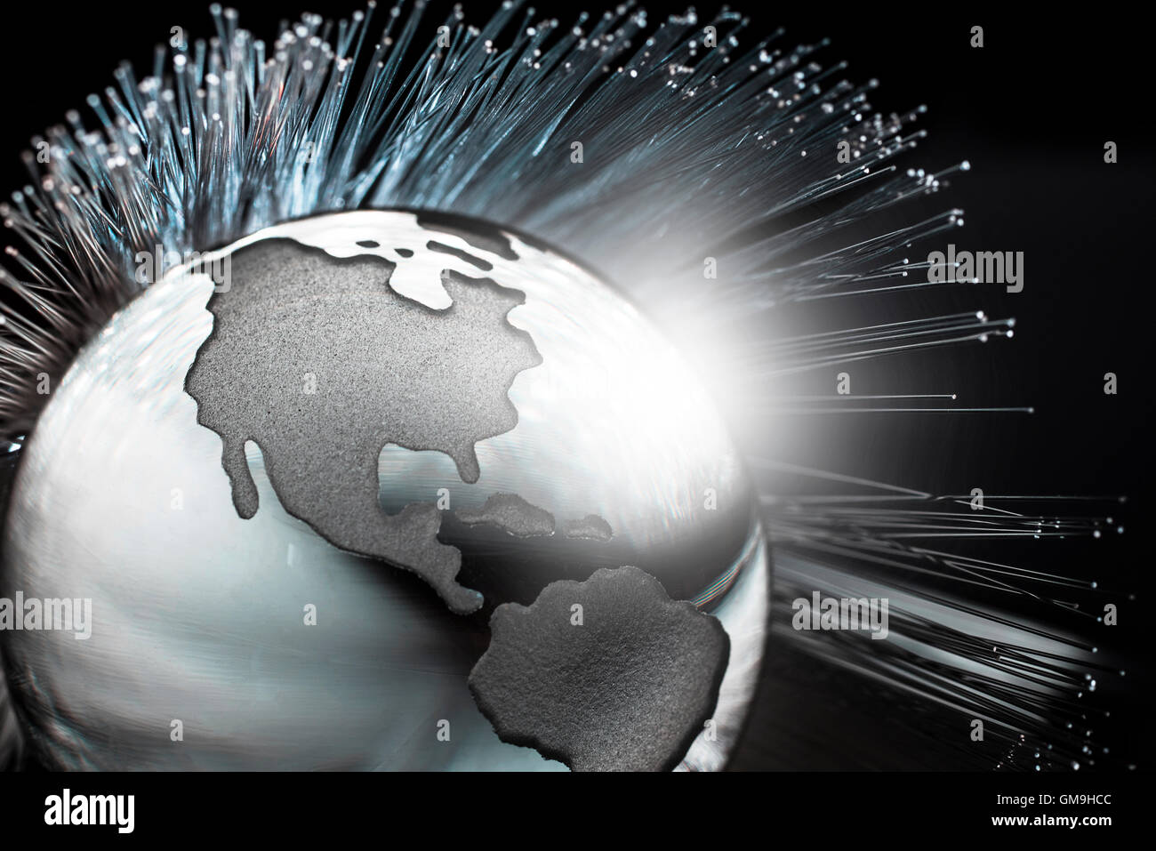 Abbildung von Faseroptik über Globus Stockfoto