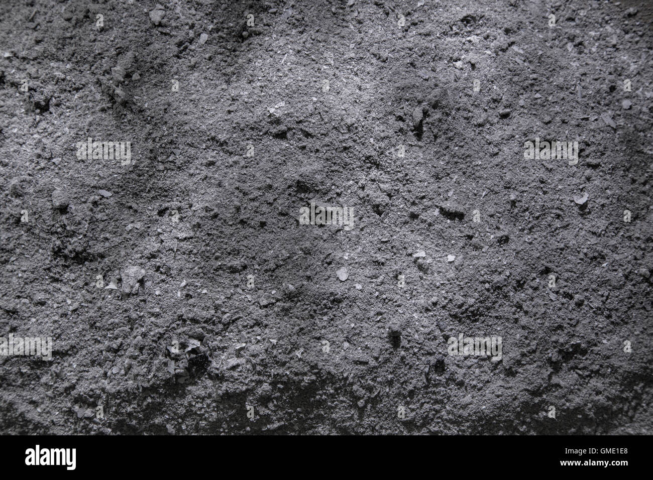 Ein Haufen Asche aus dem Holzofen. Stockfoto