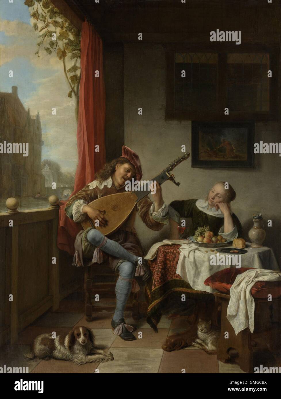 Der Lautenist, von Hendrick Sorgh, 1661, niederländische Malerei, Öl auf Holz. Junger Mann ist singen und spielen die laute auf einer offenen Veranda neben einer jungen Frau. Auf der Etage befinden, ein Hund und eine Katze und ein Gemälde der tragischen liebenden Ovids Pyramus und Thisbe, hängt an der Wand (BSLOC 2016 3 222) Stockfoto