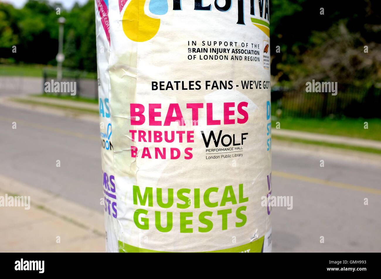 Werbung auf einer Laterne in einer kanadischen Stadt für ein Beatles Tribute Festival. Stockfoto