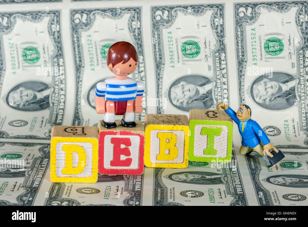 Kinder Afordability mit Schulden und Geld Stockfoto
