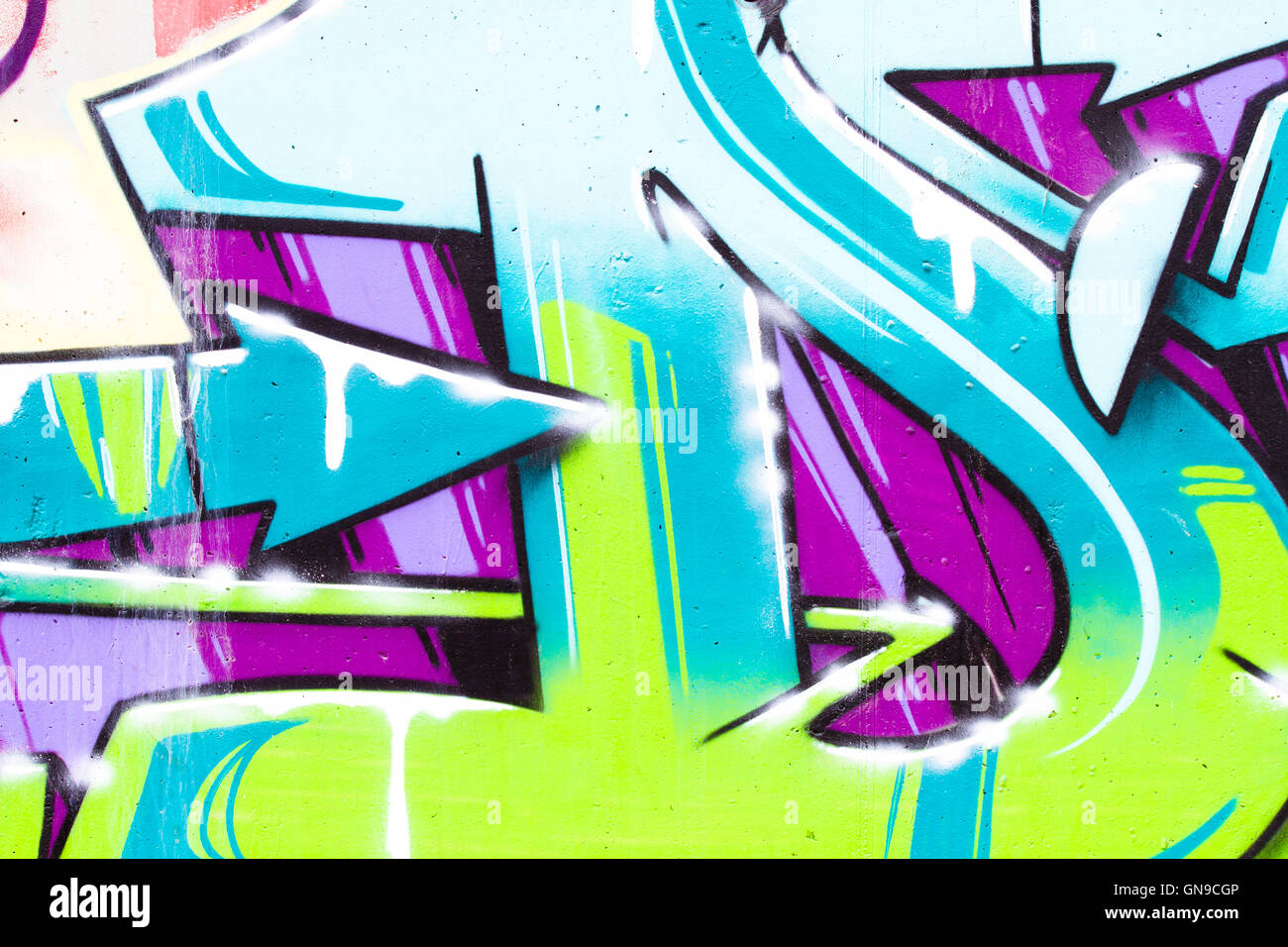 Hellen Graffiti auf Ziegel, Pfeil Design Stockfoto