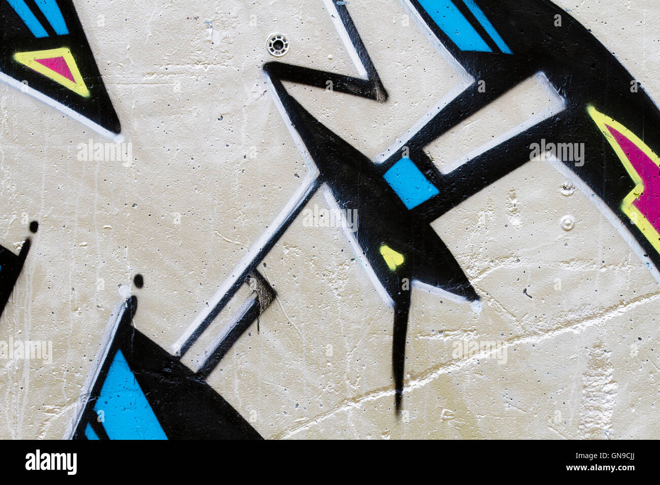 Graffiti-Wand-Hintergrund, städtische Straße Grunge-Kunst-design Stockfoto