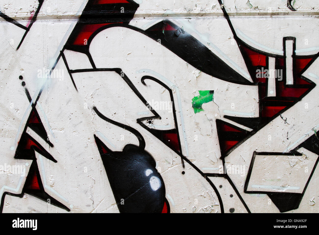 Chaotische Segment der Graffiti-Wand-Hintergrund, städtische Straße grunge Stockfoto
