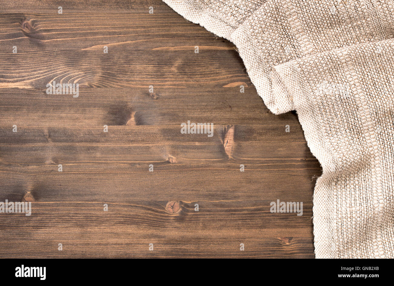 Graue handgemachte Tischdecke von rechts der Holztisch Stockfoto