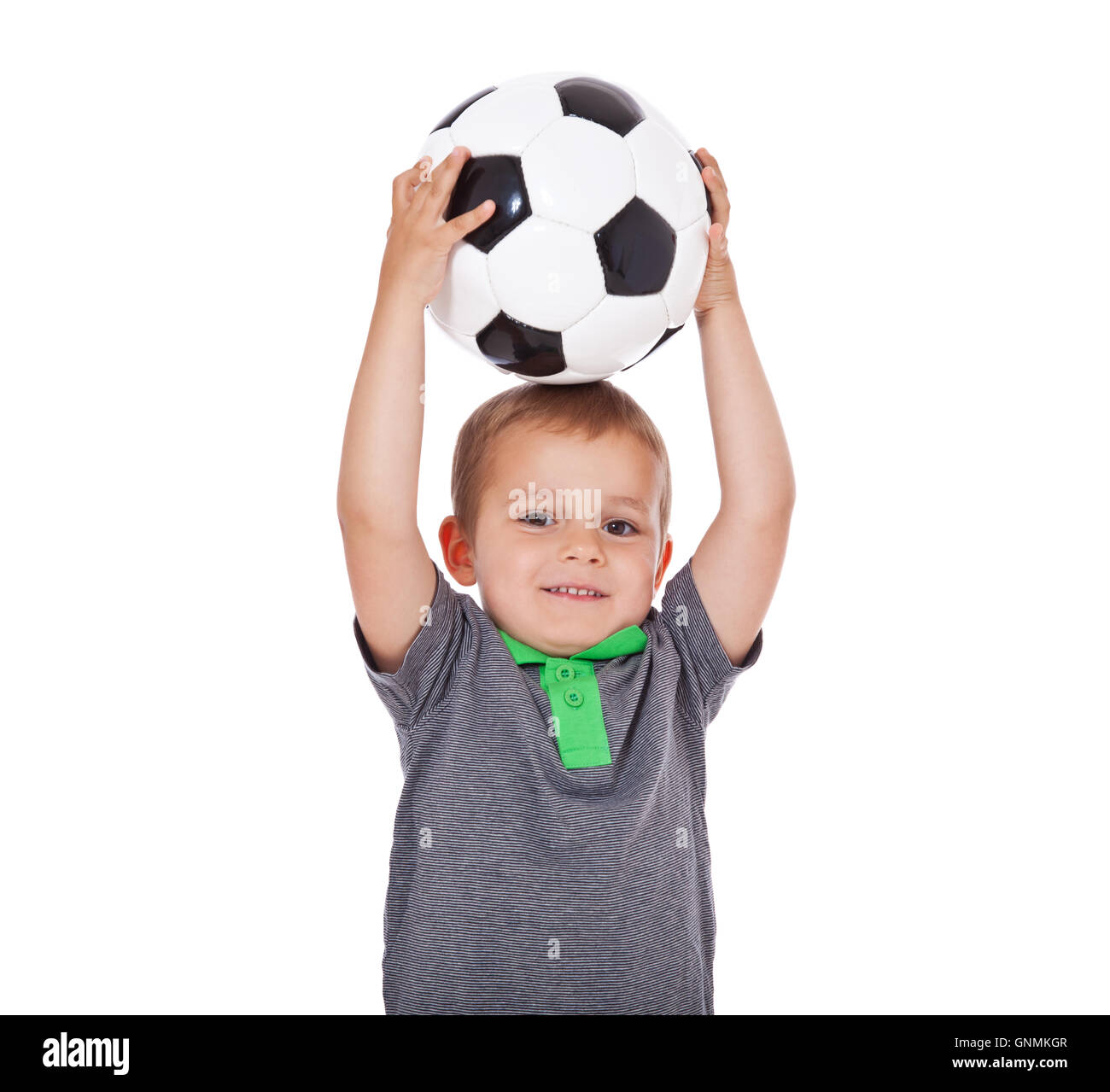 Junge mit Fussball ball Stockfoto