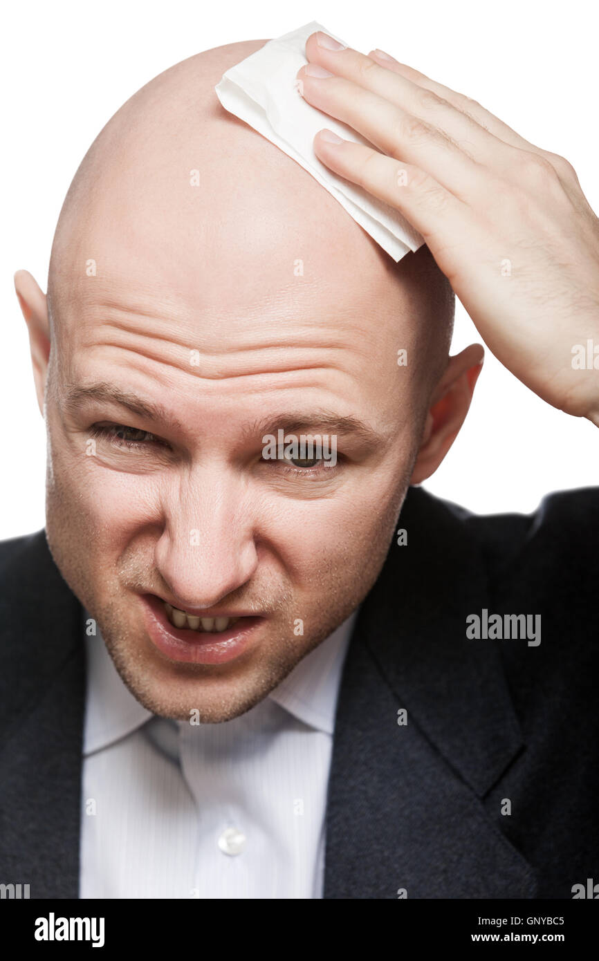 Hand, die Gewebe abwischen oder Trocknung kahlen Kopf Schwitzen Stockfoto