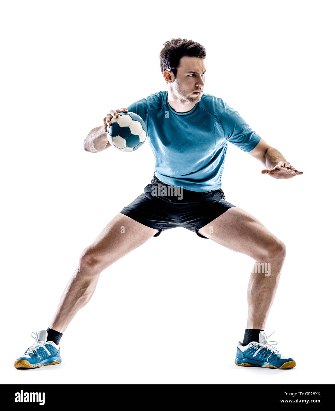 ein junger Mann Handballspieler im Studio auf weißen Hintergrund isoliert Stockfoto