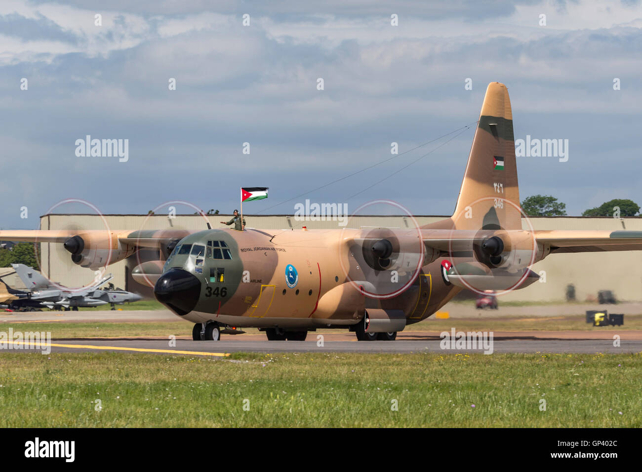 Royal Jordanian Air Force Lockheed C - 130H Abfahrt der Royal International Air Tattoo (RIAT) an RAF Fairford in Gloucestershire Stockfoto