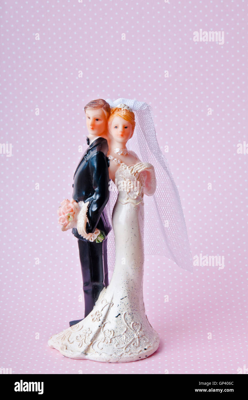 heterosexuelle Braut und Bräutigam Kuchen topper Stockfoto