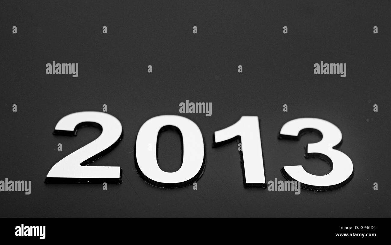 Ziffer 2013 auf schwarzem Hintergrund mit einem Textfreiraum Stockfoto