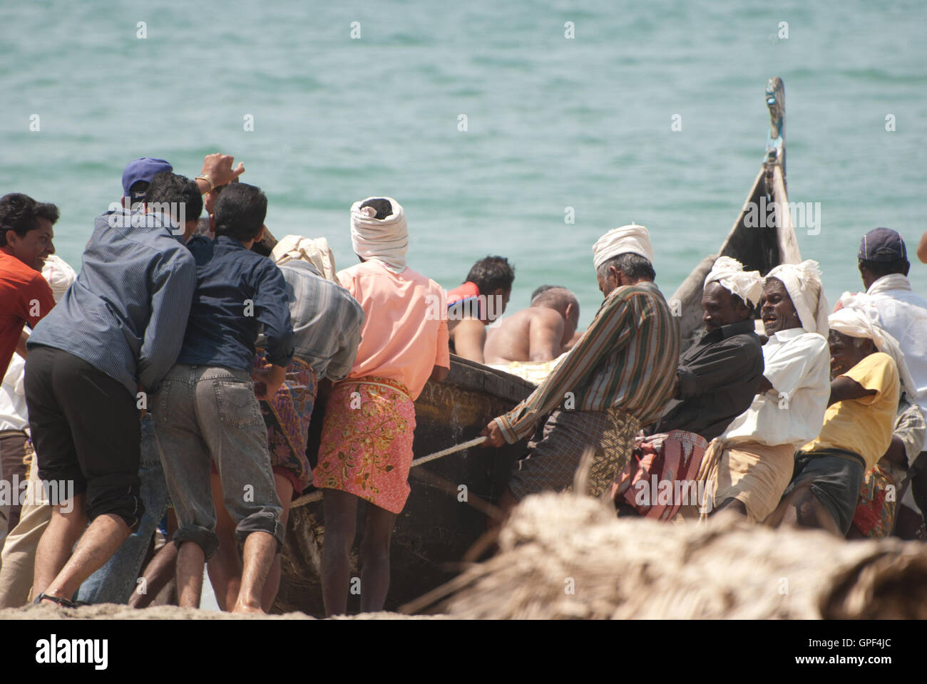 Fischer am Lighthouse Beach, Kerala, Indien. Stockfoto