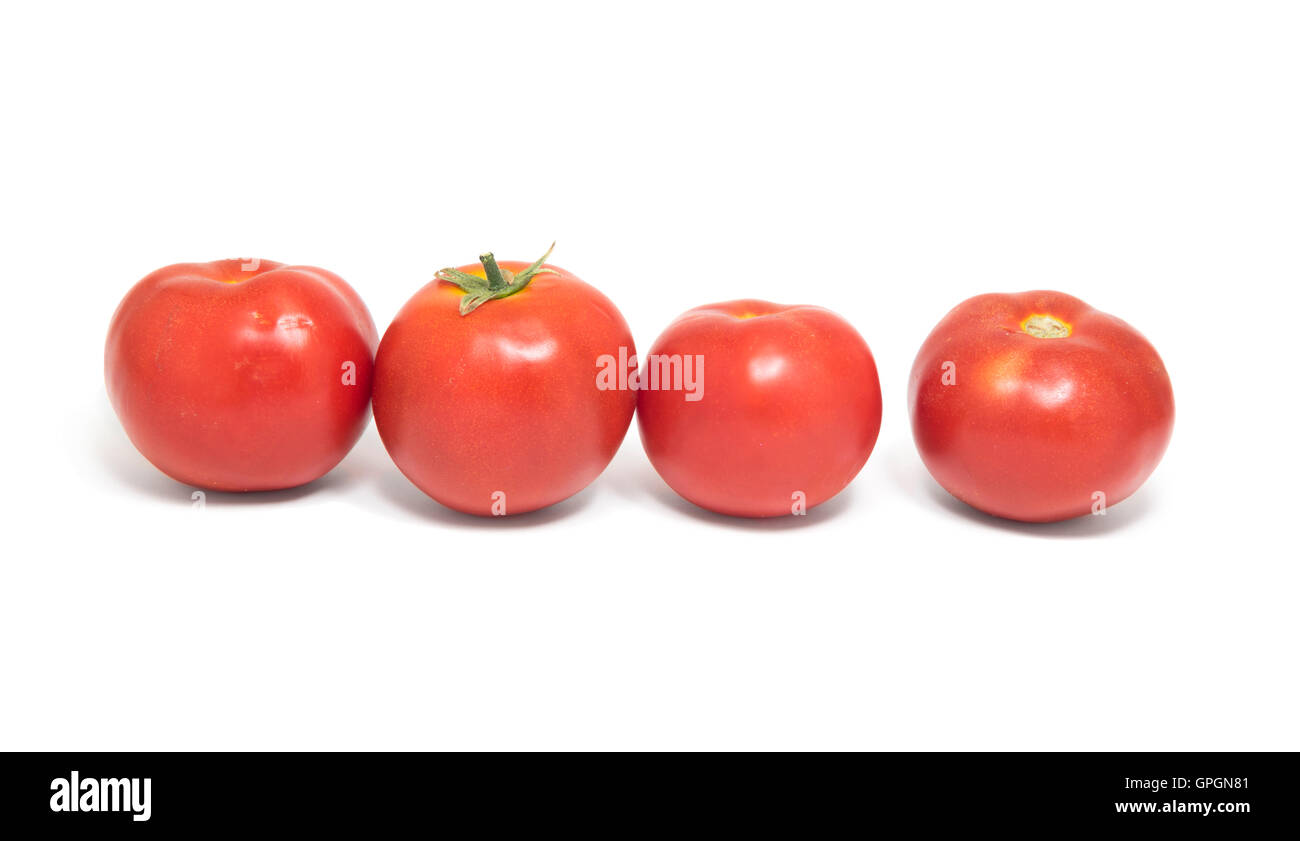 Tomaten mit einem leichten Schatten, isoliert auf weißem Hintergrund Stockfoto