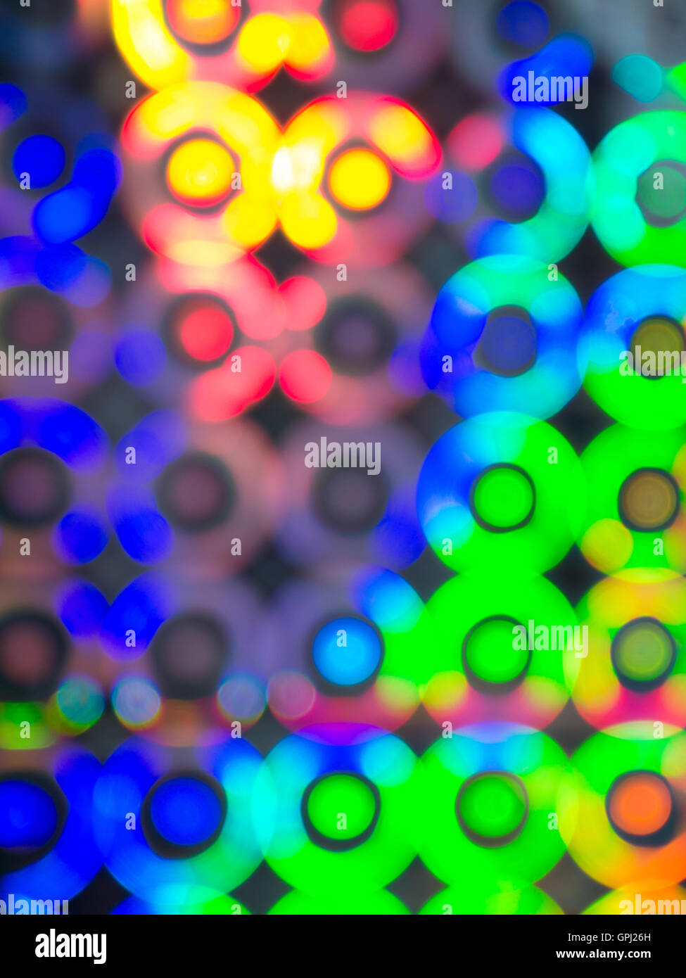Grün, blau, rot, gelb, verschwommene Kreis Lichter Hintergrund Stockfoto