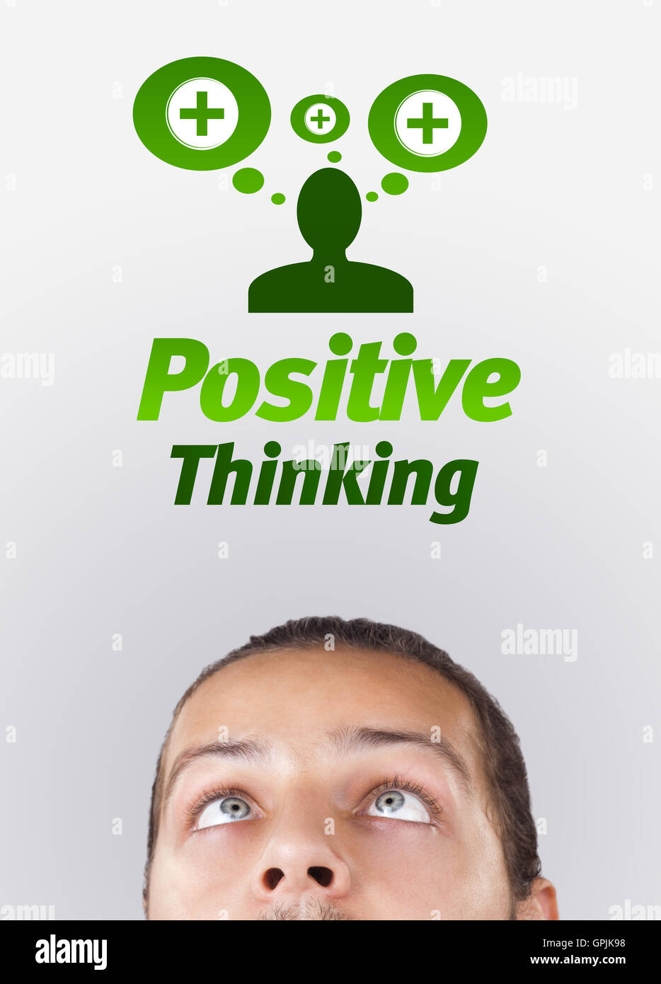 Junge Kopf Blick auf positive und negative Zeichen Stockfoto