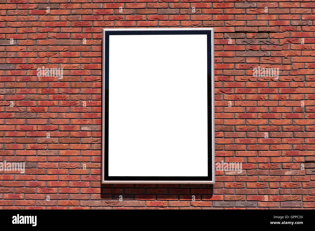 Leeren Plakatwand mit auf einer roten Backsteinmauer Stockfoto