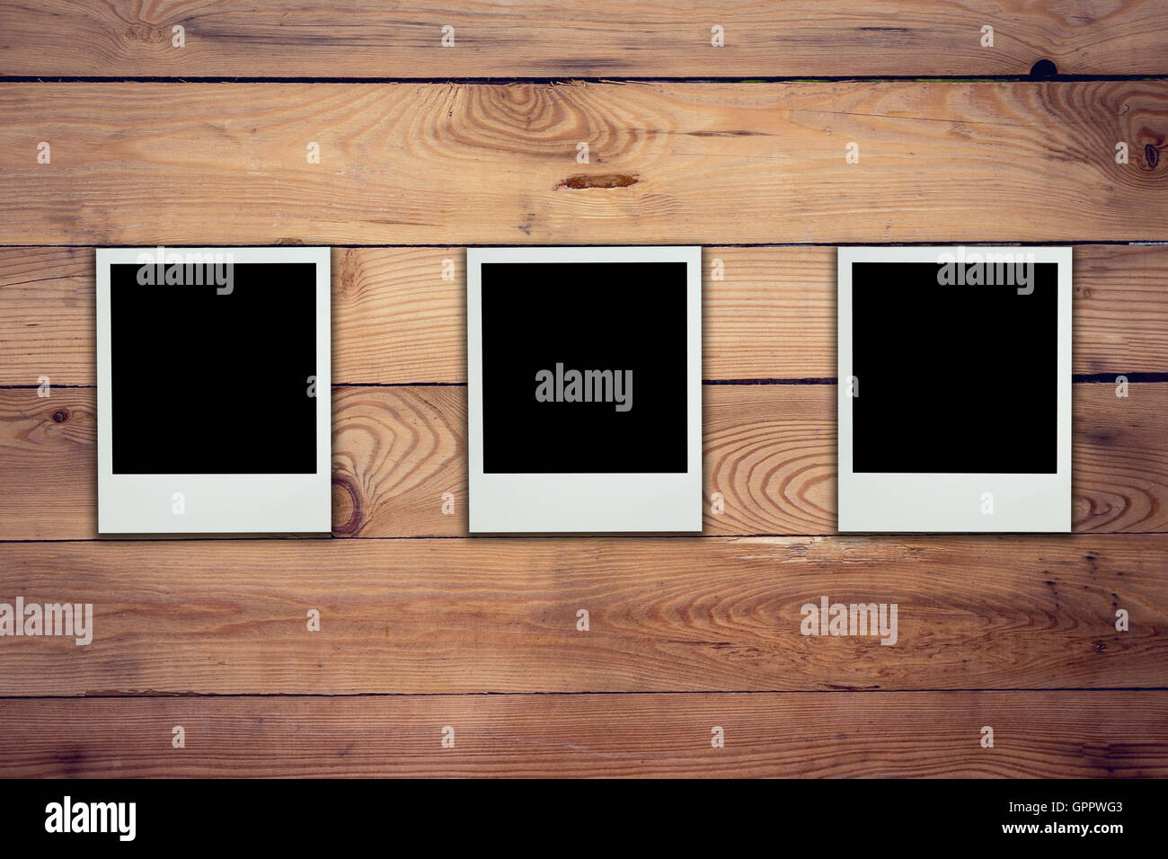 Leere Bilderrahmen auf Holz Hintergrund und Struktur Stockfoto
