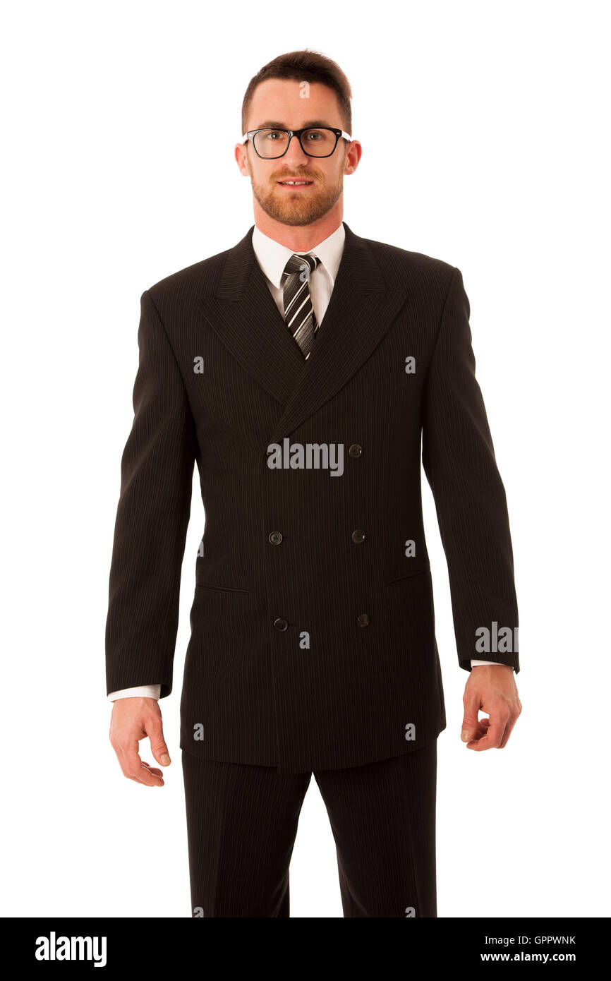 Erfolgreicher Geschäftsmann in formellen Anzug selbstbewusst überragt weiß isoliert. Stockfoto