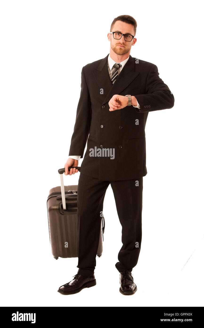Erfolgreicher Geschäftsmann in formellen Anzug und Aktenkoffer gehen auf Geschäftsreise über weißen isoliert. Stockfoto
