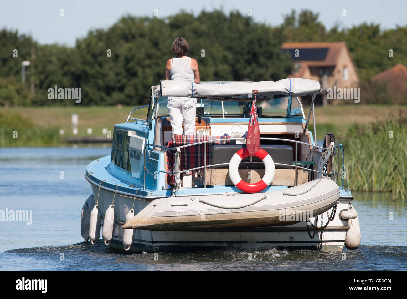 Frau Treiber Fluss Kreuzer auf den Fluss great ouse Stockfoto