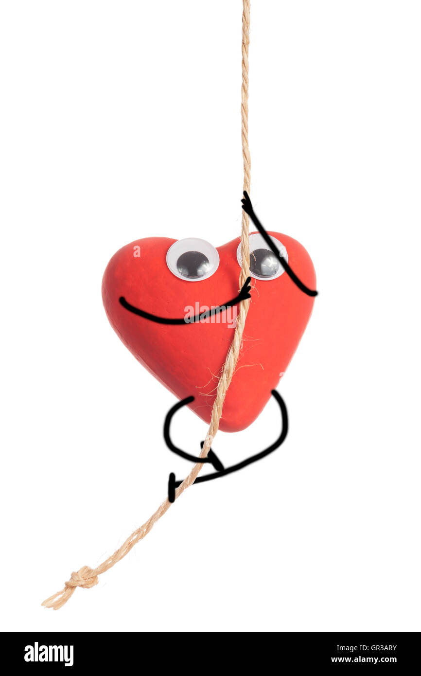 Rotes Herz Charakter Klettertau isoliert auf weißem Hintergrund Stockfoto