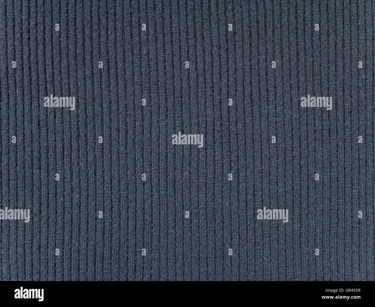 Grau geriffelt fein gestrickter Wolle Stoff kühles Wetter Hintergrund Stockfoto