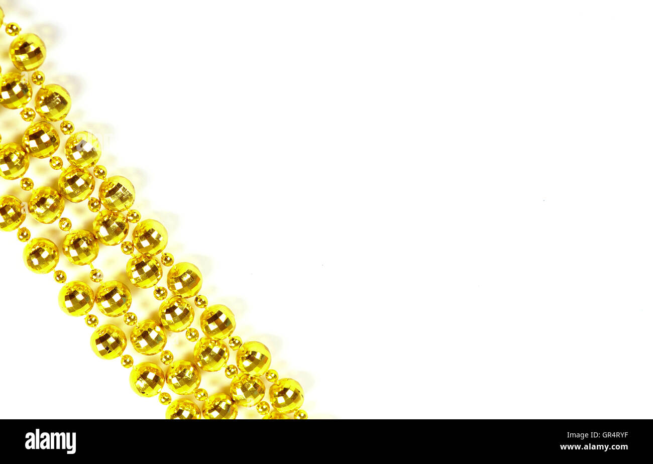 Hintergrund von einem brillanten festlichen Perlen von goldener Farbe gemacht Stockfoto