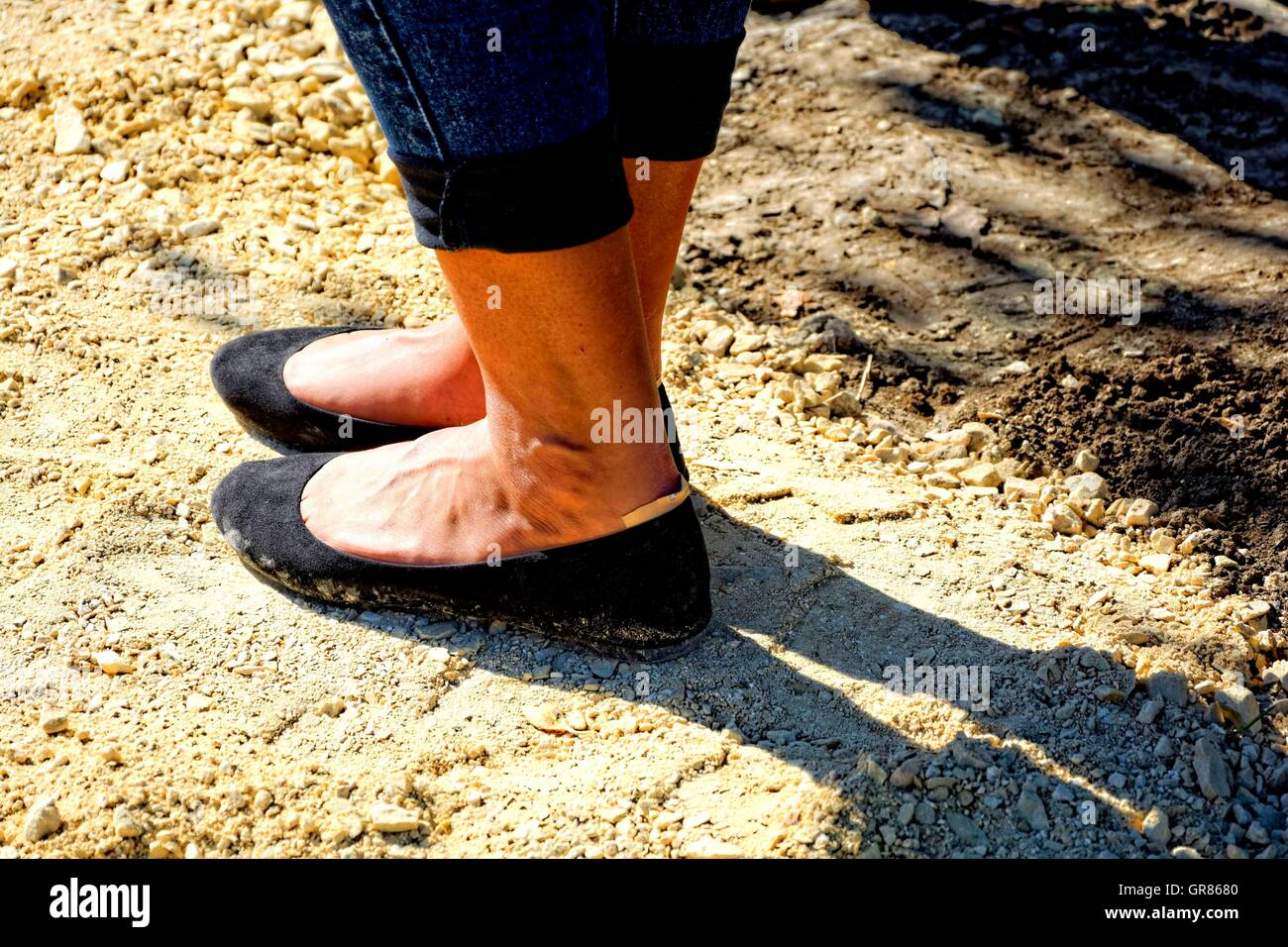 Die Probleme liegen In Slipper Schuhe Stockfoto