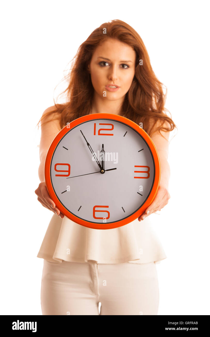 Frau zeigt eine Uhr als Zeichen der spät über weißen isoliert Stockfoto