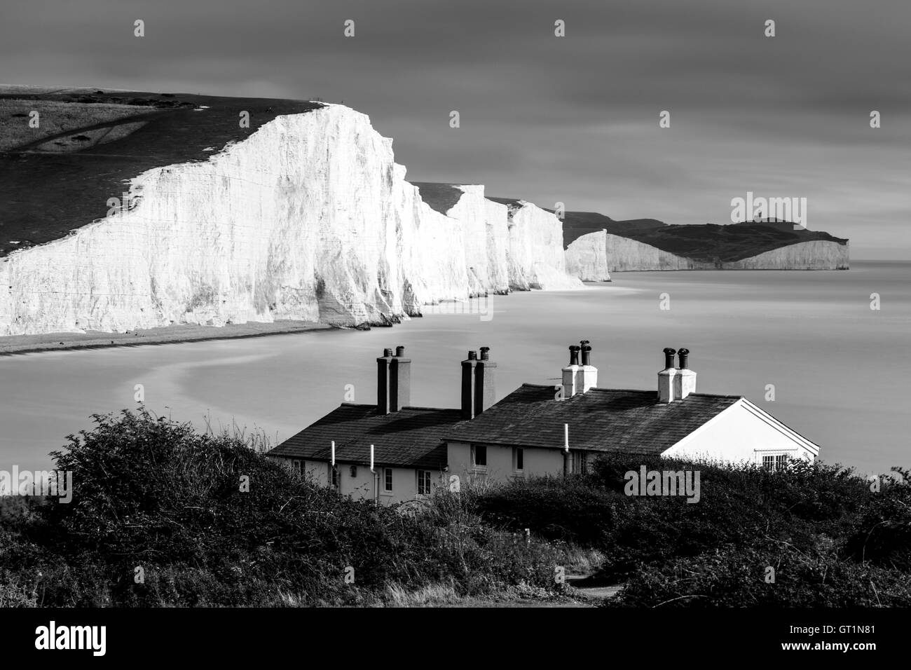 Sieben Schwestern und Coastguard Cottages, Seaford, Ostsussex, Großbritannien Stockfoto