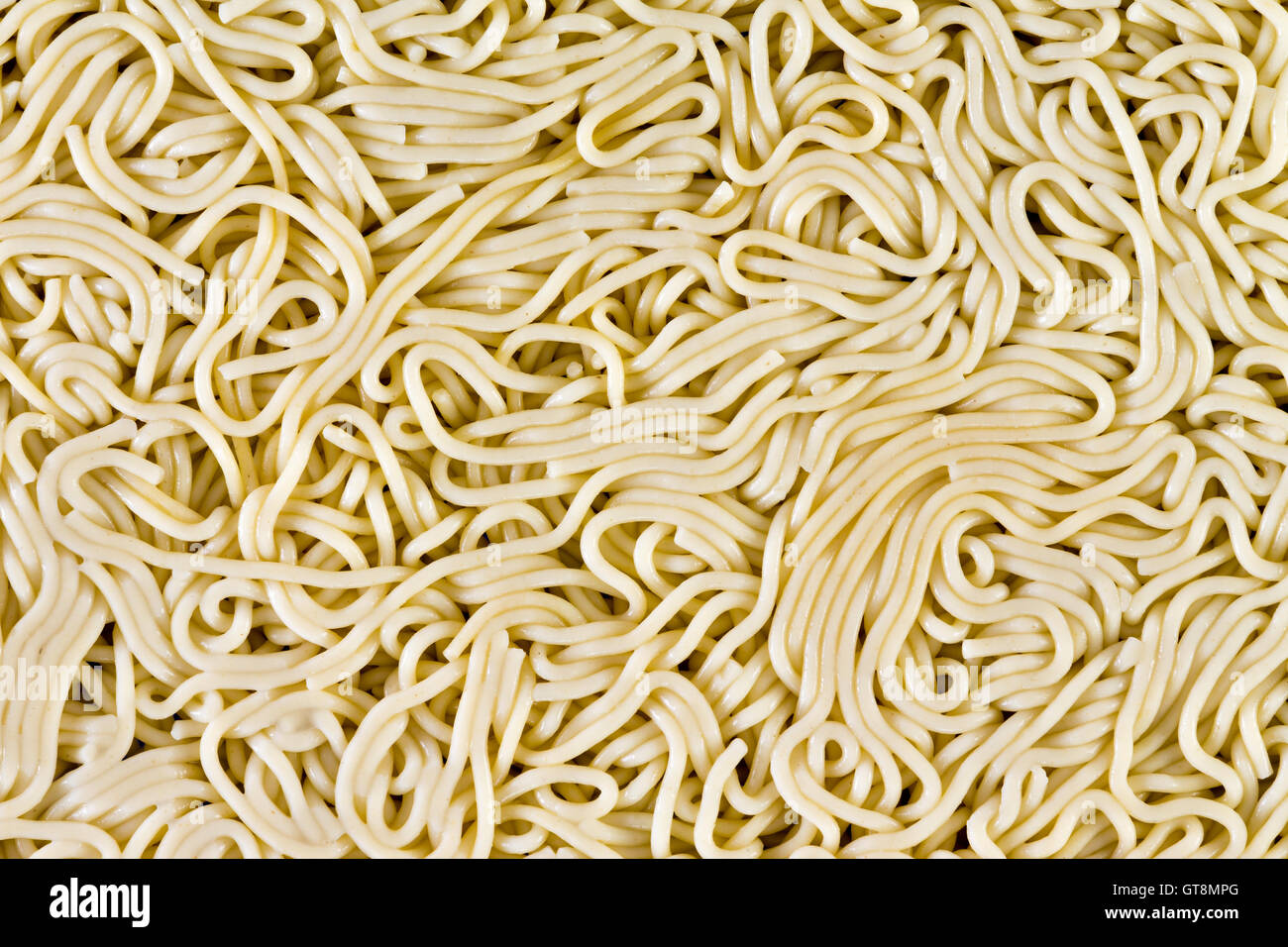 Gekochte Spaghetti Hintergrund konzeptionelle Rätsel, Labyrinth oder kompliziert gewundenen Verbundnetz in einem Overhead fr volle Stockfoto