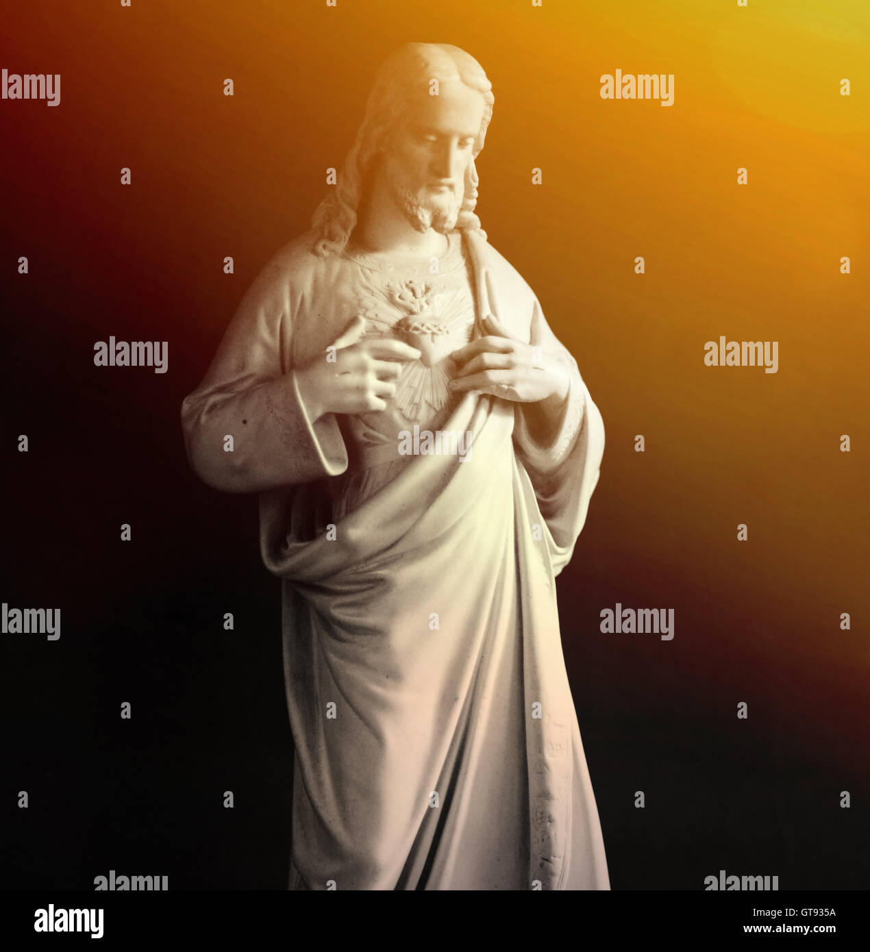 Jesus Christus-Statue mit Sonne Strahl Stockfoto