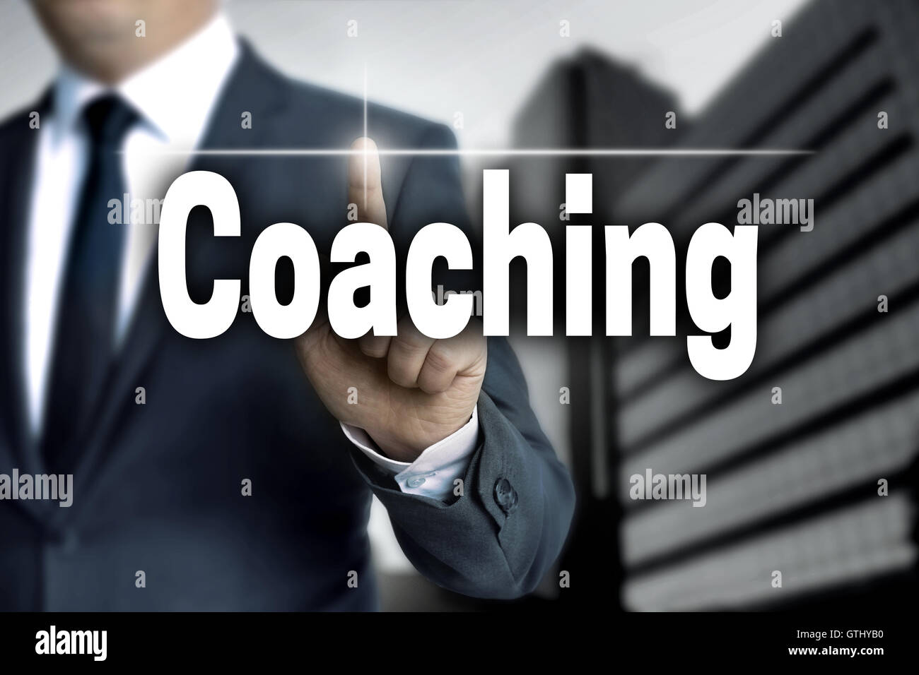 Coaching Touchscreen gesteuert Geschäftsmann. Stockfoto