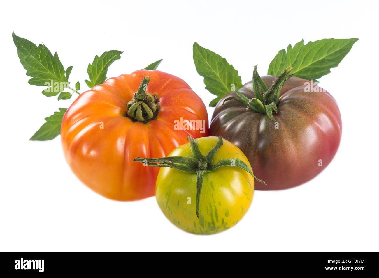 verschiedene alte Sorte Tomaten isoliert auf weiss Stockfoto