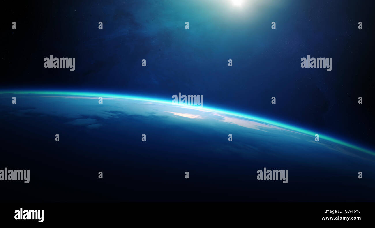 Sonnenaufgang über dem Planeten Erde mit bewölkten Ozean und vom Weltraum aus gesehen Stockfoto