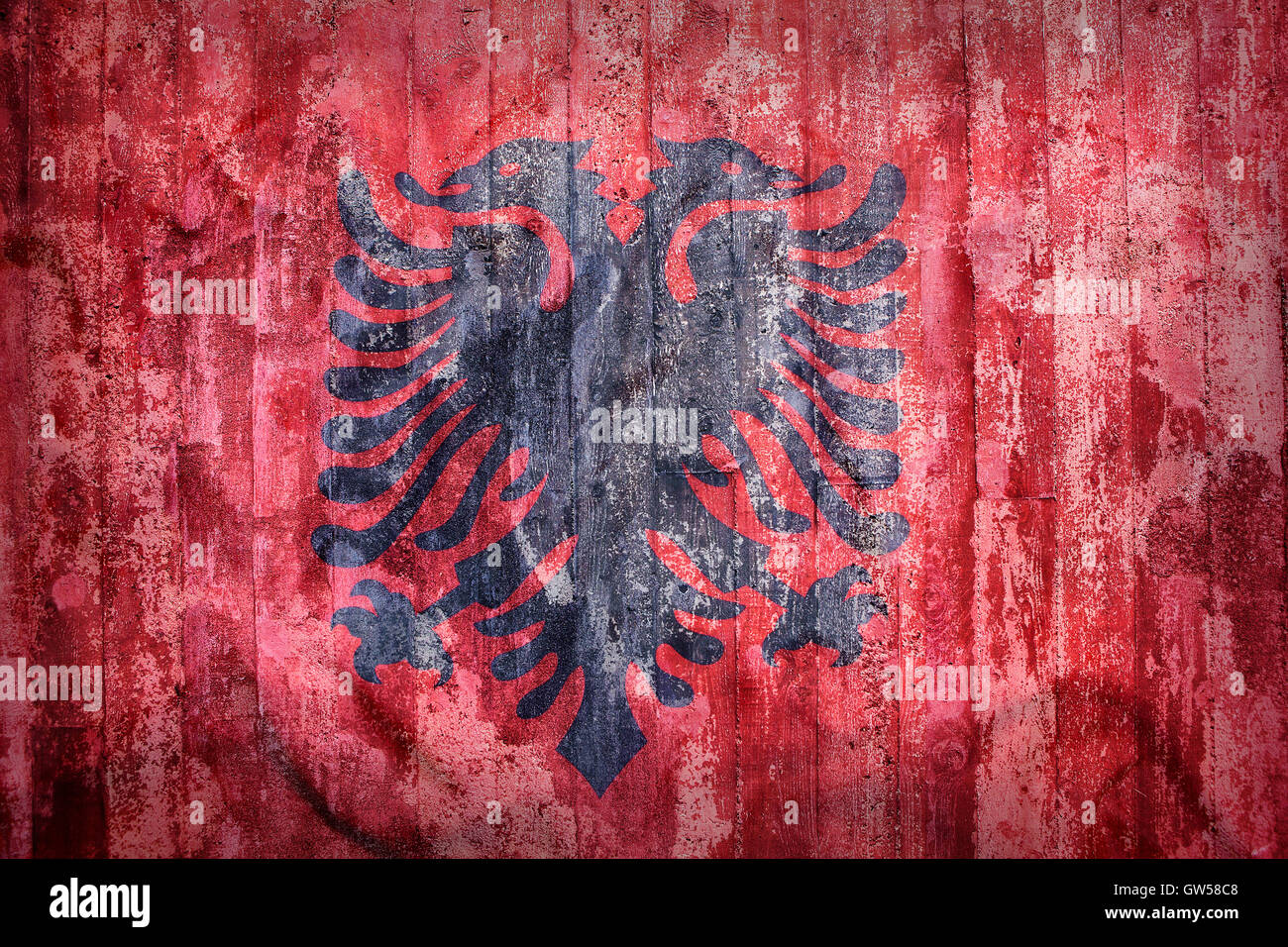Grunge-Stil von Albanien Flagge auf eine Mauer für Hintergrund Stockfoto