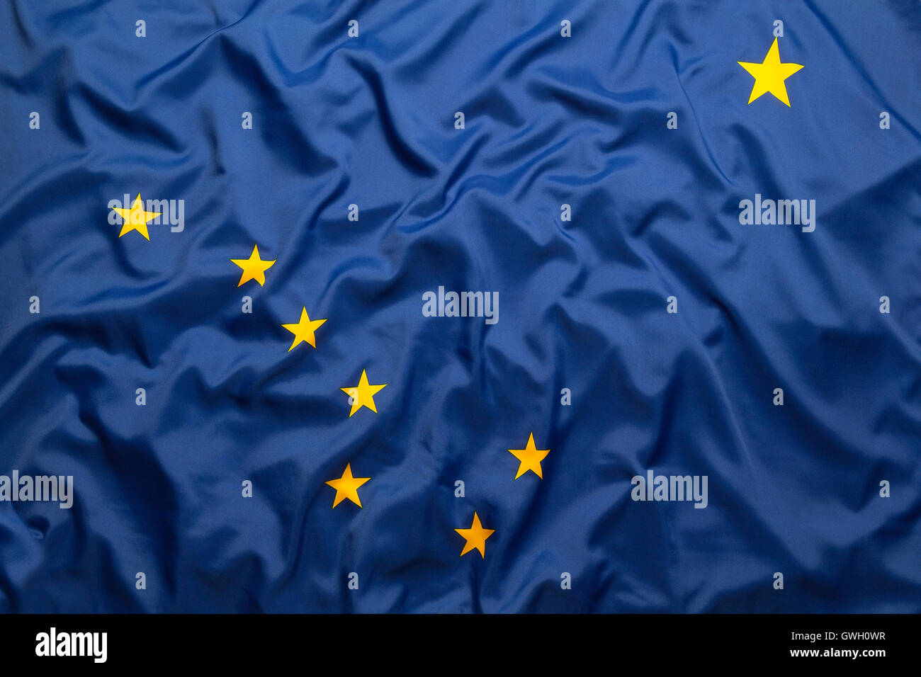 Textil-Flagge von Alaska für Hintergrund Stockfoto