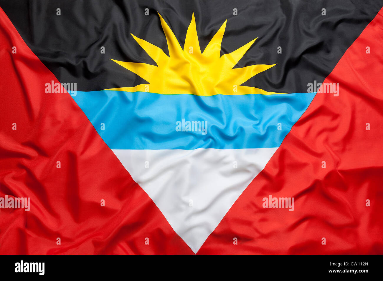 Textil-Flagge von Antigua und Barbuda für Hintergrund Stockfoto