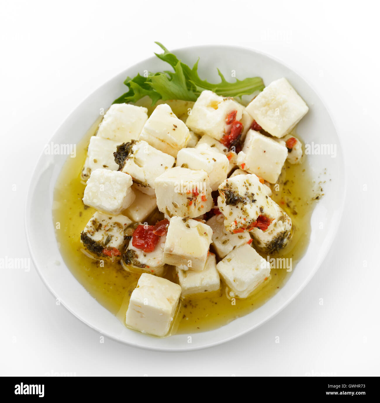 Feta-Käse mit Öl und Kräutern Stockfoto